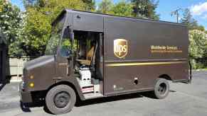 UPS delivery truck parked in left front angle view