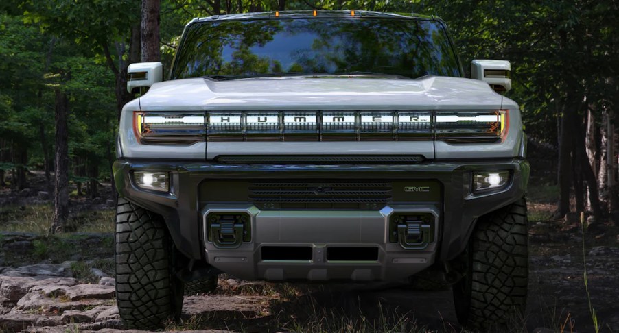 A gray GMC Hummer EV is parked.