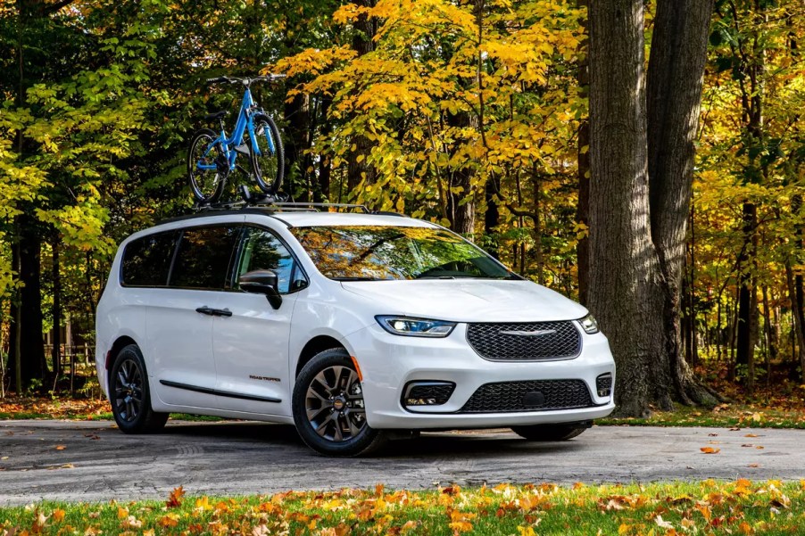 a white 2023 Chrysler Pacifica Road Tripper package minivan