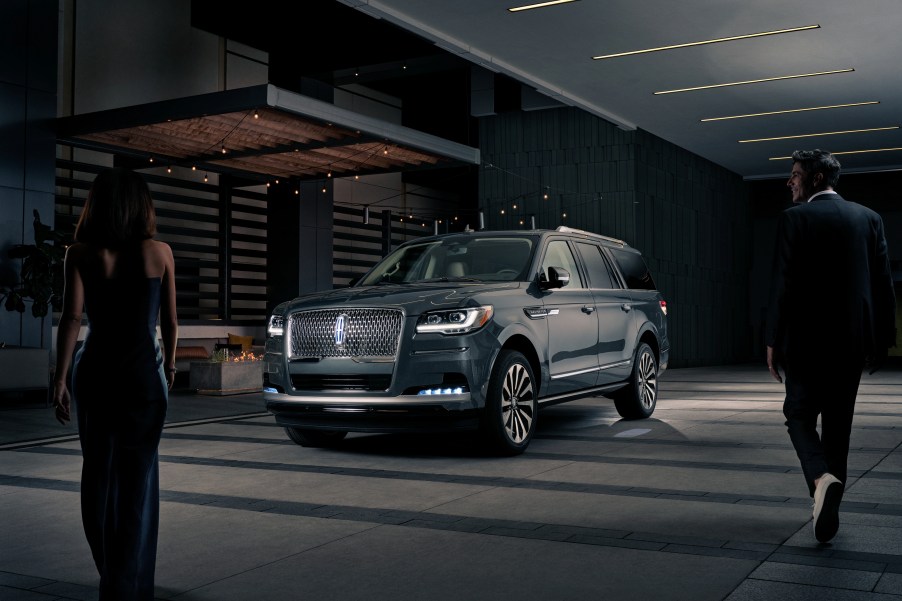 A 2023 Lincoln Navigator parked in a dark parking garage with owners approaching.