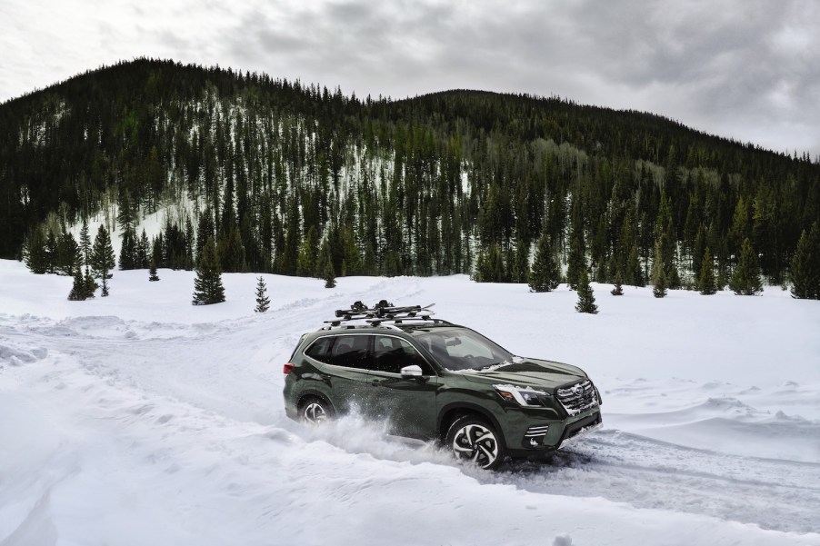 A 2023 Subaru Forester driving in the snow