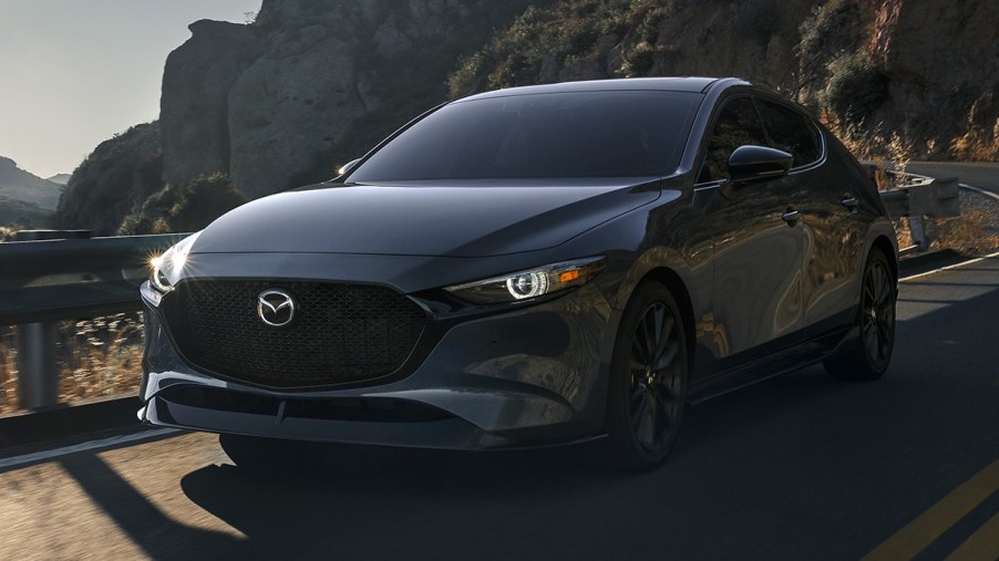 Front angle view of gray 2023 Mazda3 compact car