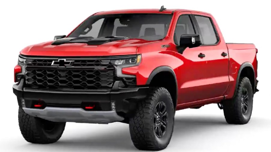 Front angle view of new 2023 Chevy Silverado 1500 pickup truck with Radiant Red Tintcoat exterior paint color