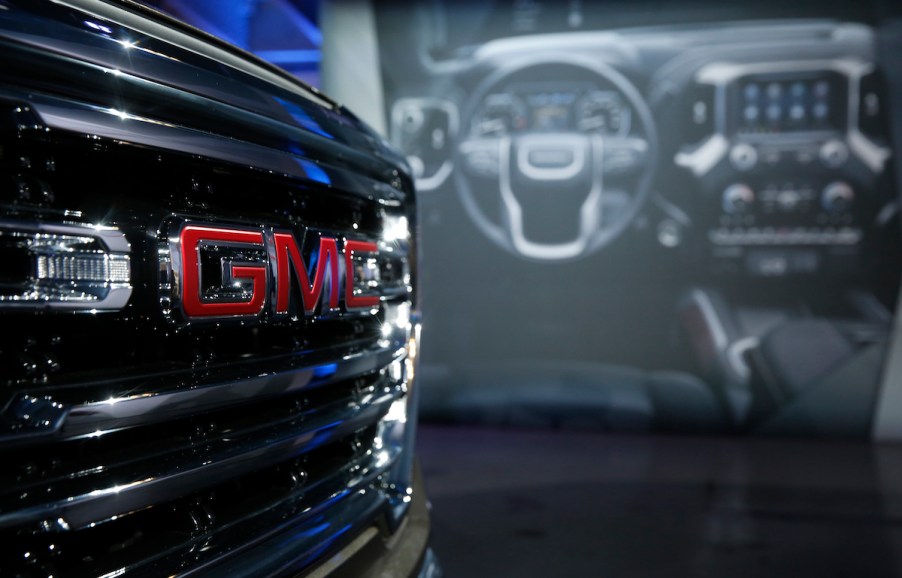 GMC logo on a Sierra, which ties as the best mpg truck.