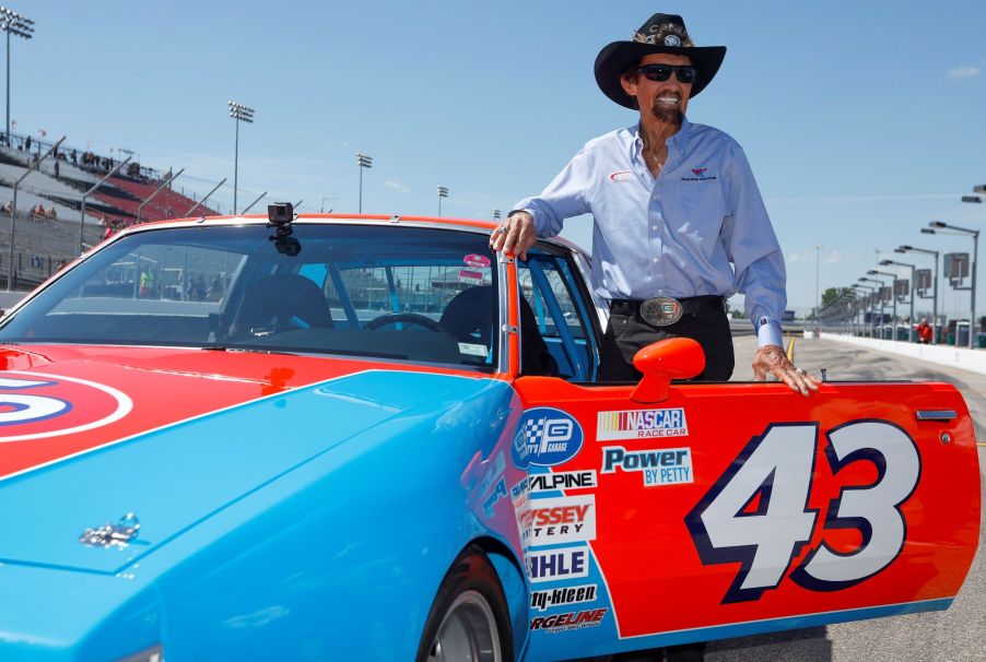 NASCAR Hall of Famer Richard Petty with a replica of his #43 STP Pontiac at the WWT Raceway in Madison, Illinois