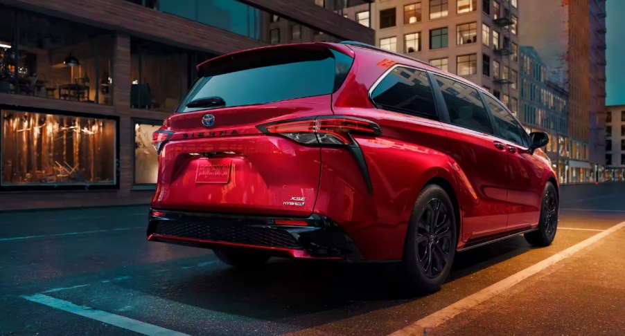 the rear end of a red 2023 Toyota Sienna