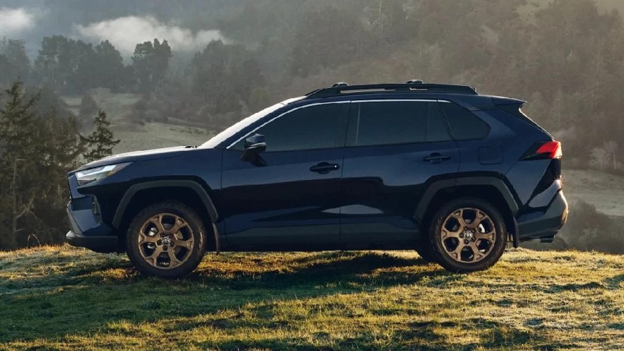 Side view of black 2023 Toyota RAV4 crossover SUV