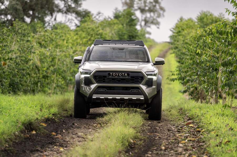 The 2024 Toyota Tacoma Trailhunter off-roading in mud