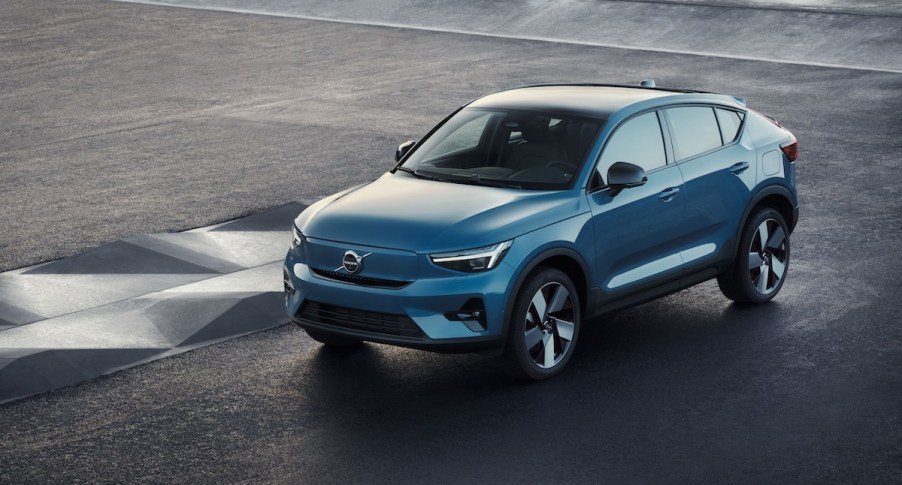 A light blue C40 recharge on a blacktop surface, which is one of the best electric SUVs.