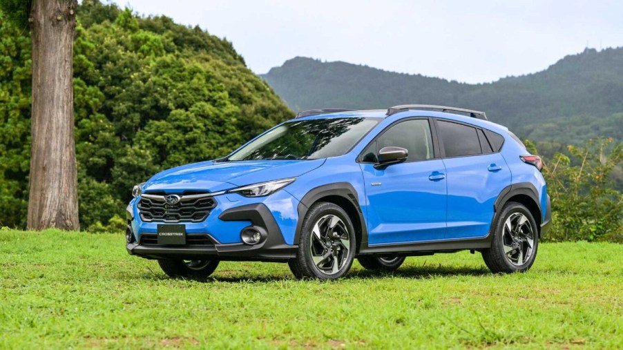 Blue 2023 Subaru Crosstrek Parked on Grass