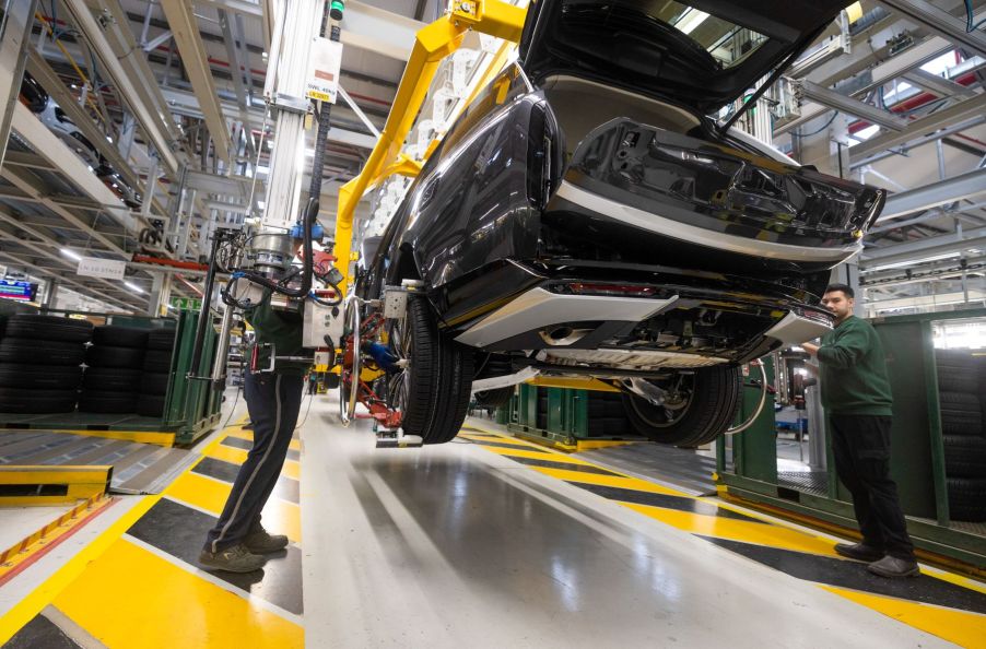 The assembly of a four-wheel drive model at a Tata Motors Ltd.'s Jaguar Land Rover plant in Solihull, U.K.