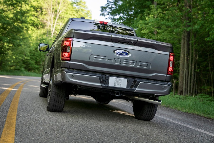 A 2023 Ford F-150 driving down the road, which is one of the best full-size trucks of 2023.