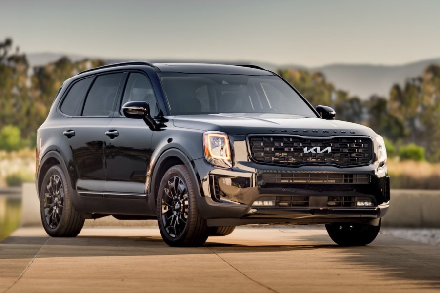 2022 Kia Telluride parked in a wooded area where information regarding Kia Telluride insurance costs may be important in case of an accident.