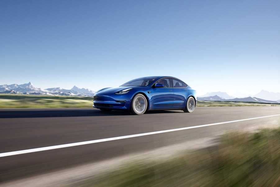 A 2022 Tesla Model 3 has problems, although it looks planted driving on back roads.