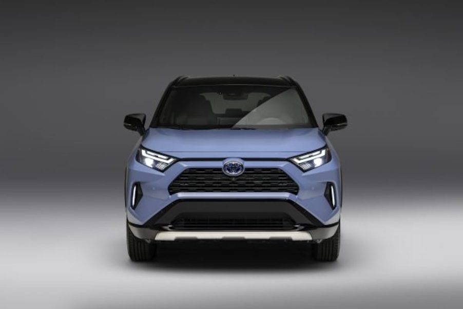 A light blue 2023 Toyota RAV4, which is one of three, so which RAV option Is cheapest to own.