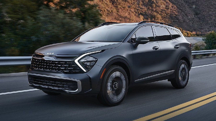 Front angle view of gray 2023 Kia Sportage Plug-In Hybrid crossover SUV