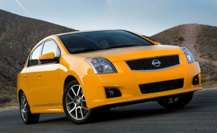 A yellow 2009 Nissan Sentra SE-R compact sedan model