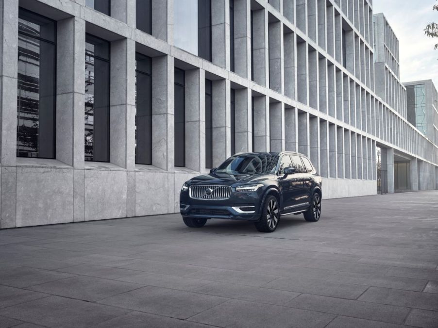 A 2023 Volvo XC90 parked outside of a building.