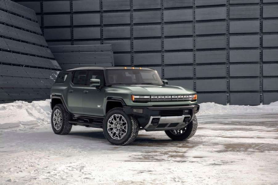 The 2024 GMC Hummer EV SUV parked in the snow