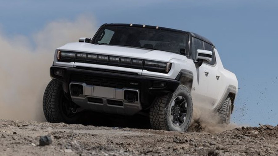 GMC Hummer EV Truck on Dirt-Covered Trail