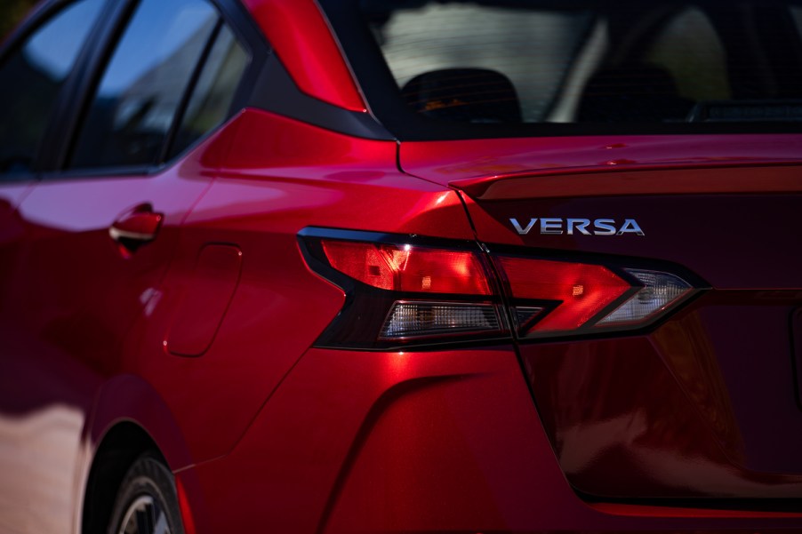 rear fender of a red Nissan Versa