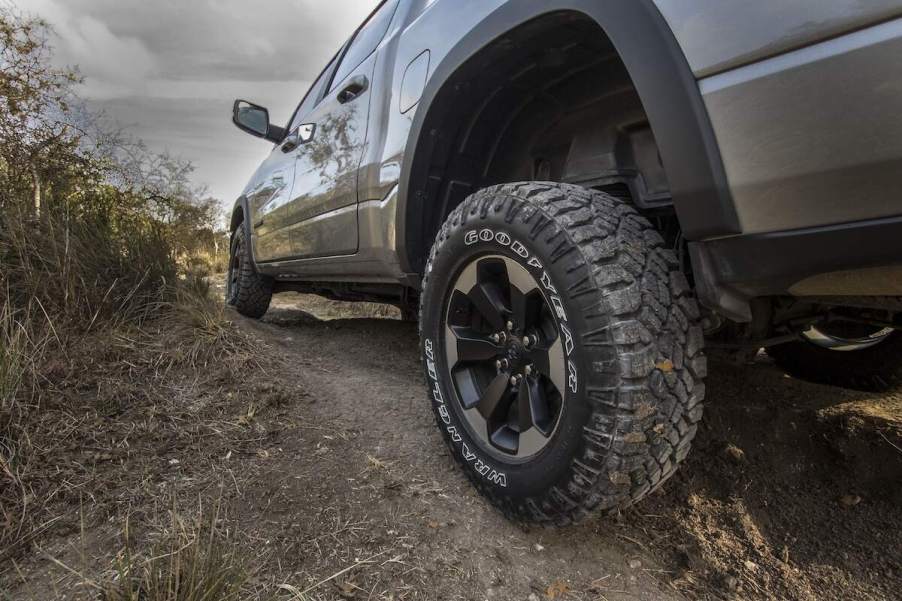 A 2023 Ram 1500, which is one of the best pickup trucks, parked outdoors going off-roading.