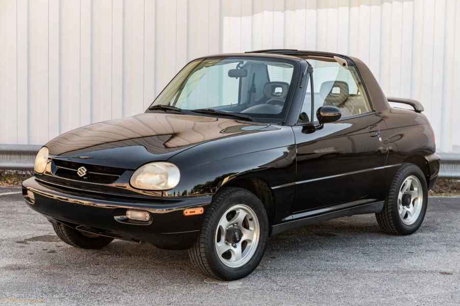 A black 1996 Suzuki X-90 4x4 SUV