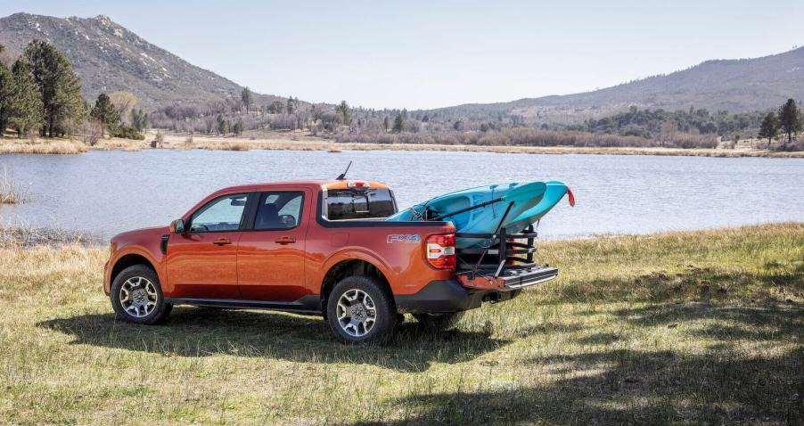 The Ford Maverick parked in front of a lake. The 2023 Maverick is potentially a better buy than the 2023 Ford Ranger.