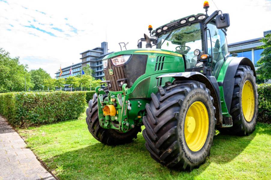 John Deere tractor sitting on grass