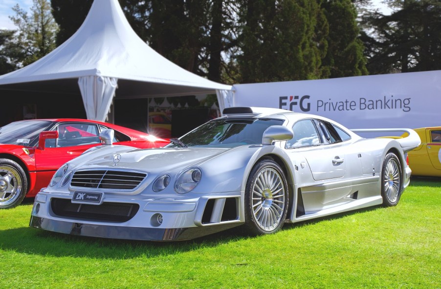 A silver Mercedes-Benz CLK GTR car at a car show