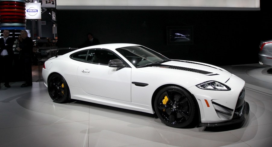 a white XKR Jaguar at a car show