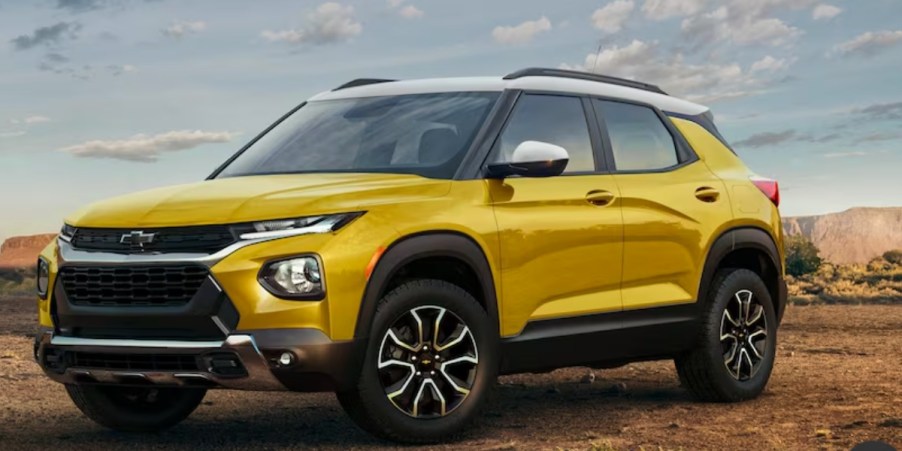 A yellow 2023 Chevrolet Trailblazer on display outside