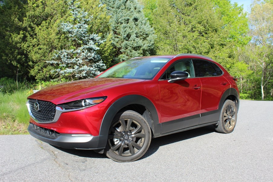 The 2023 Mazda CX-30 parked near foliage