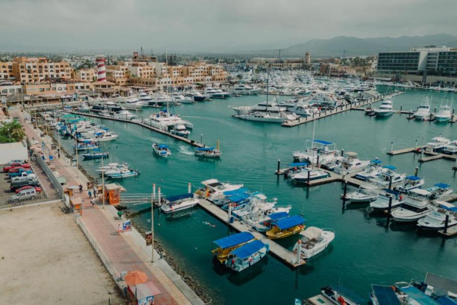 An arial shot on a busy marina with a lot of boats.