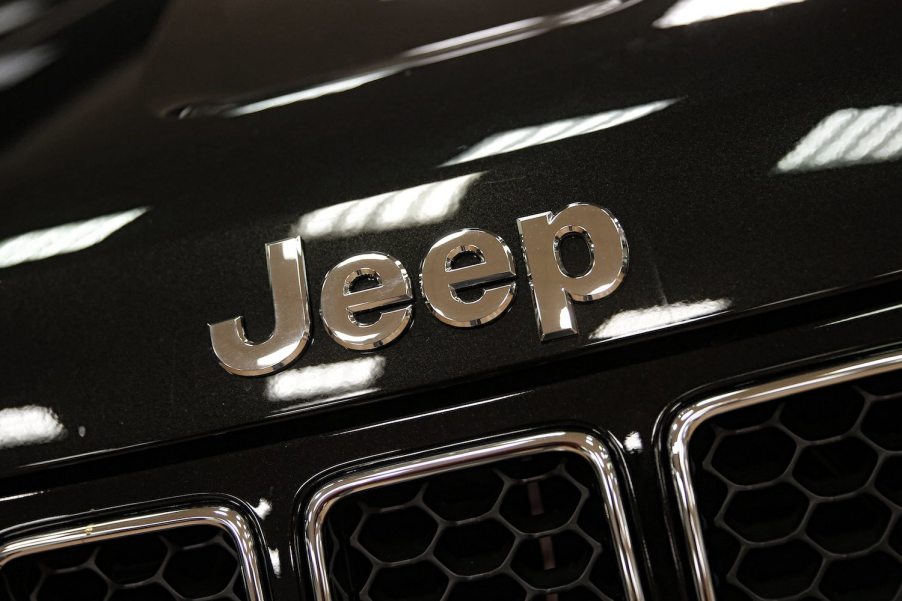 Closeup of the logo of a Jeep that is not American-made, but assembled in Italy instead.