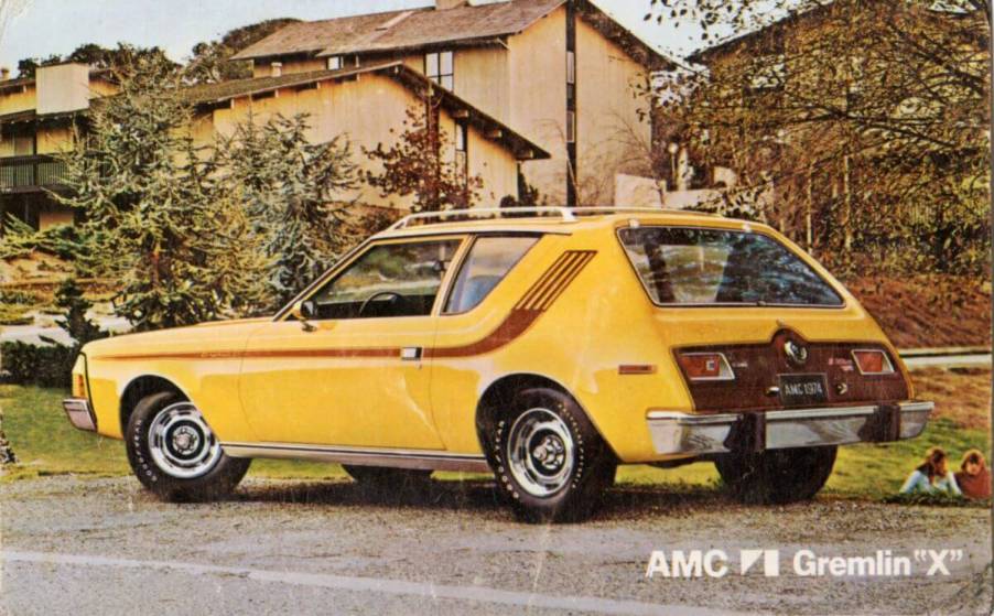 A postcard advertisement of a yellow AMC Gremlin X compact car hatchback sedan from 1974