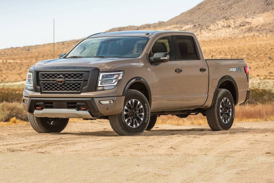 The 2023 Nissan Titan off-roading in the desert sand