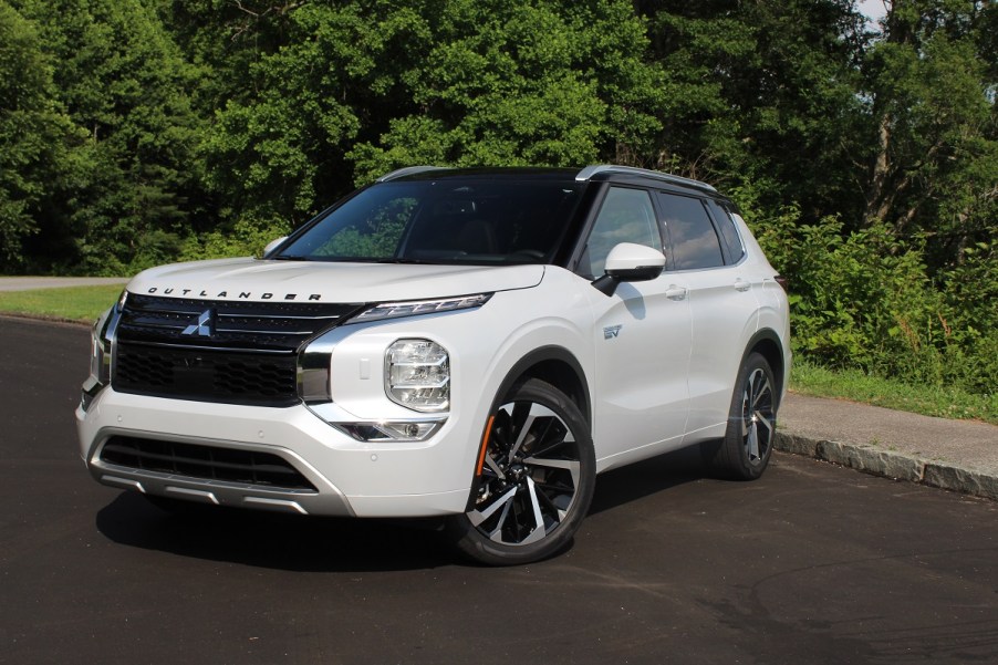 The 2023 Mitsubishi Outlander PHEV parked on pavment