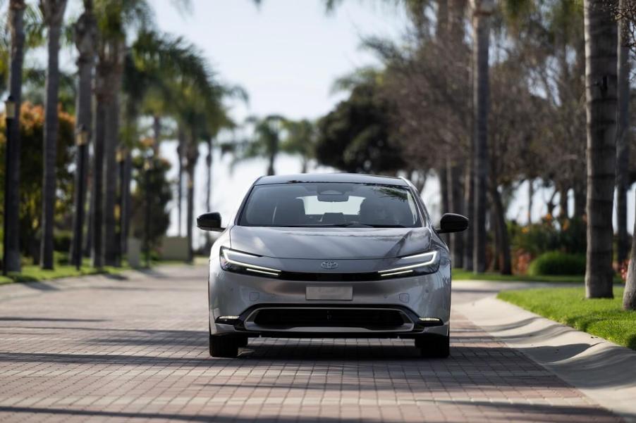 A silver 2023 Toyota Prius Prime shows off its small car proportions and front-end styling.