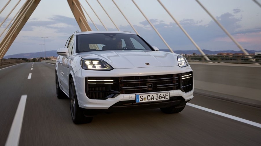 White 2024 Porsche Cayenne Turbo E-Hybrid front 3/4 view