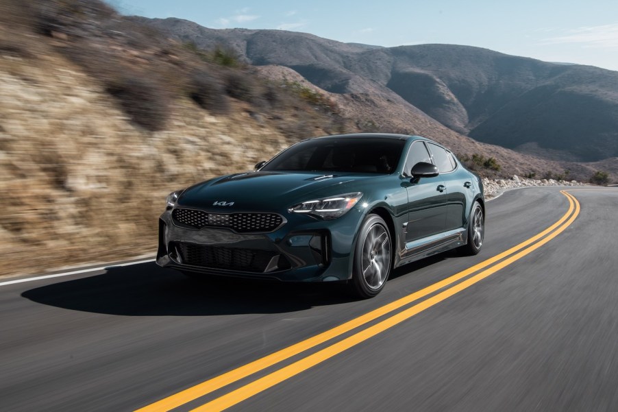 Kia sales indicate that the Kia Stinger, pictured in gray driving on a dry road, is at the bottom of Kia sales.