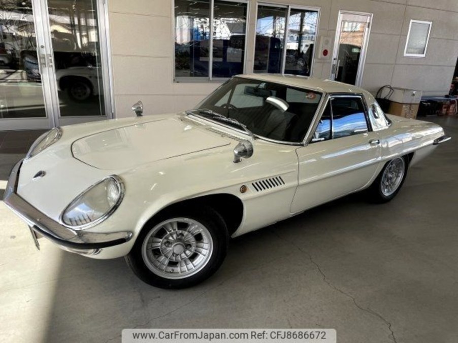 White 1968 Mazda Cosmo Sport in showroom