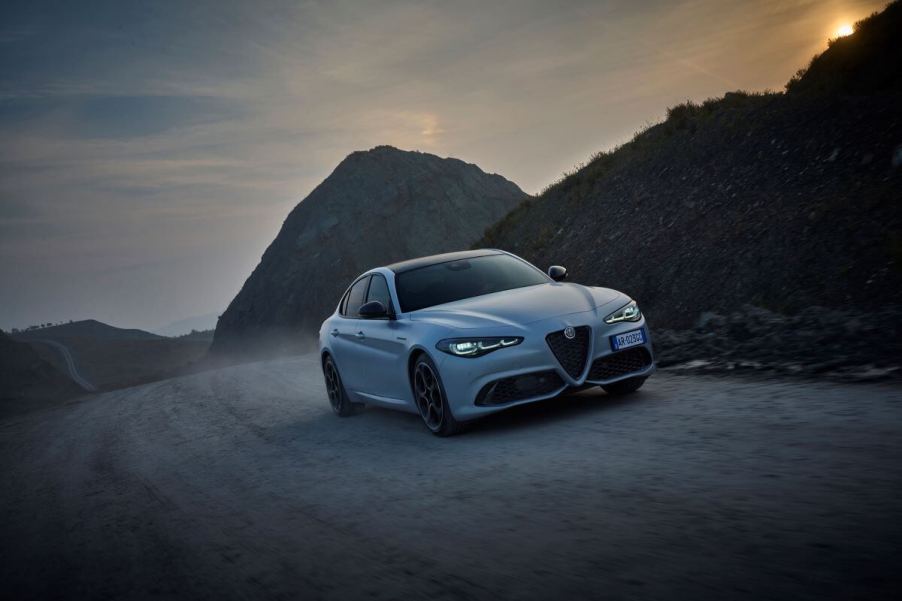 A 2024 Alfa Romeo Giulia Competizione compact executive car/sports sedan model in Moonlight Gray