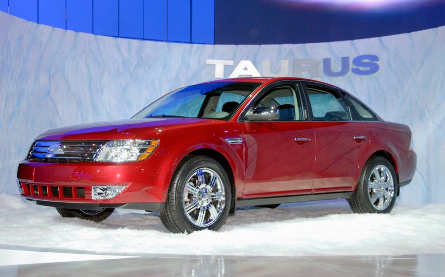 A 2008 Ford Taurus on a showroom floor