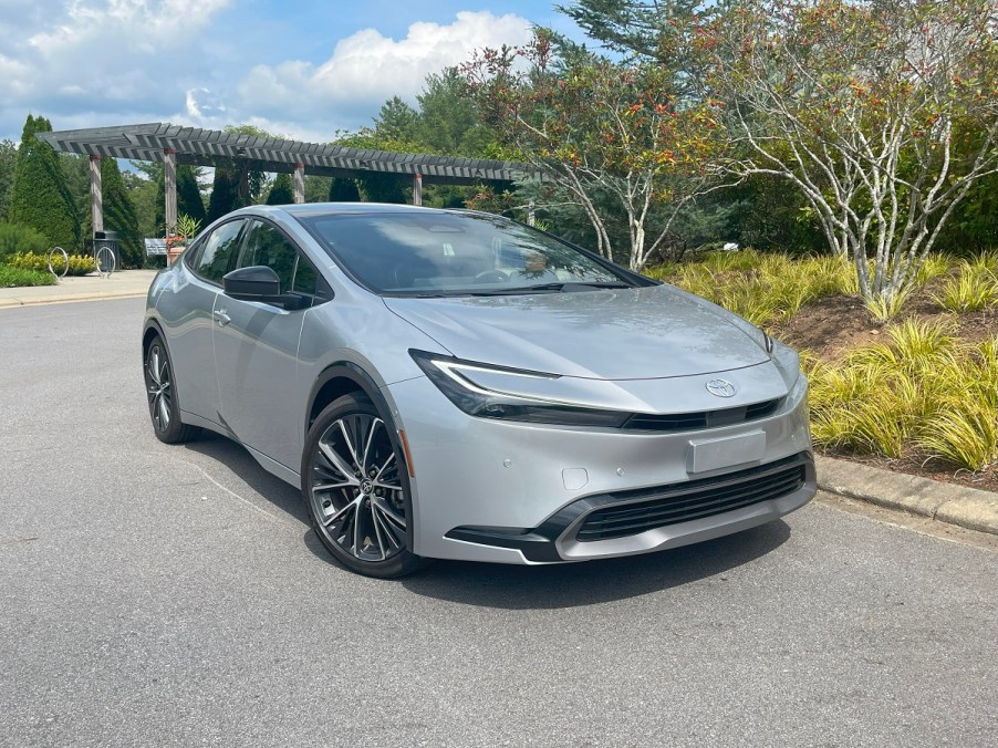 The 2023 Toyota Prius parked near trees