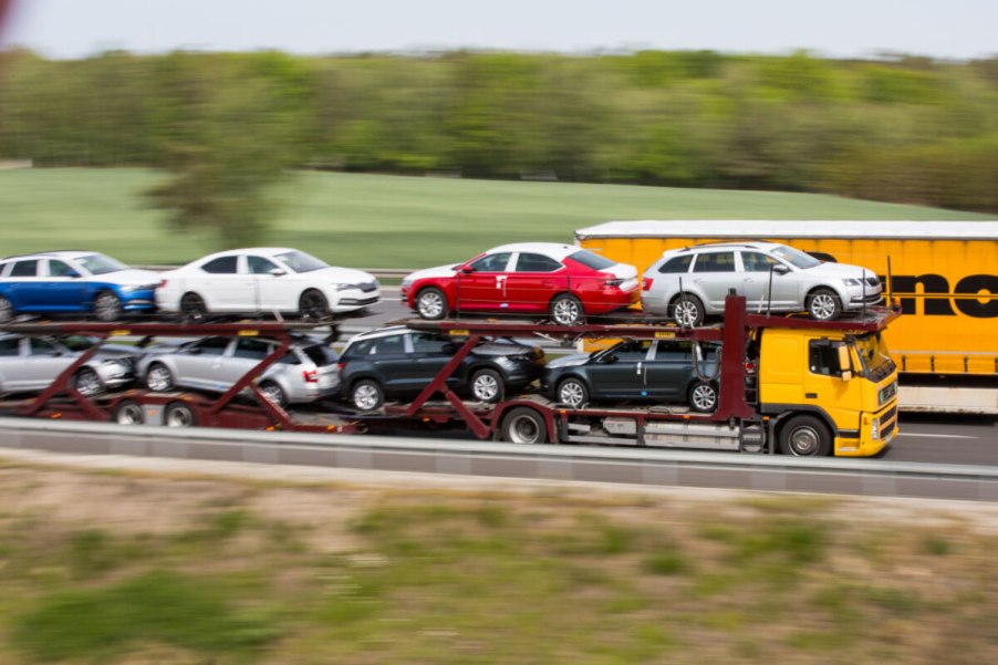 Transporter carrying new vehicles in Europe