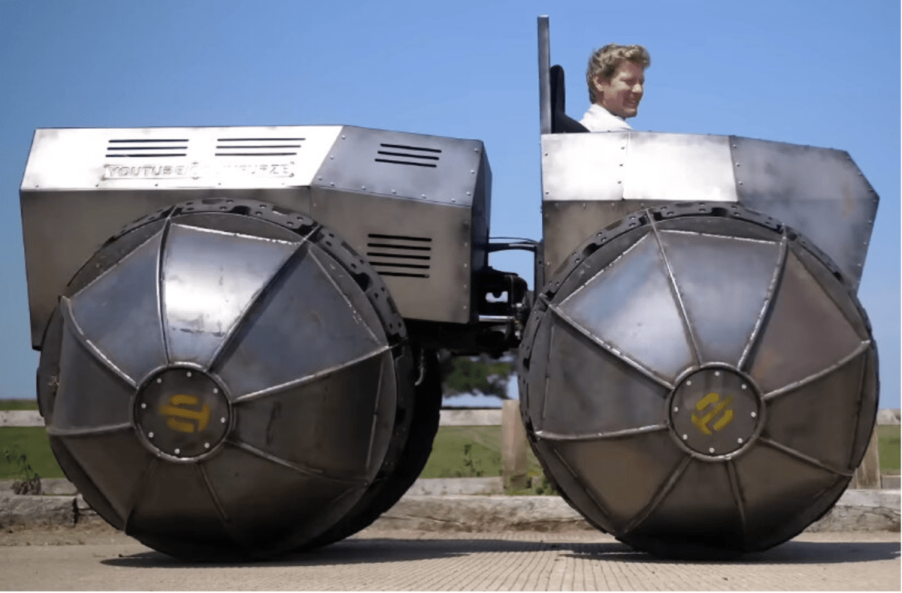 Colin Furze sitting in amphibian Rhino Tank