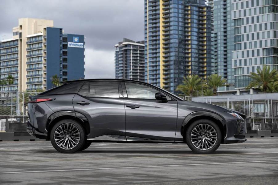 A side profile shot of a 2023 Lexus RZ 450e Luxury AWD all-electric luxury SUV model