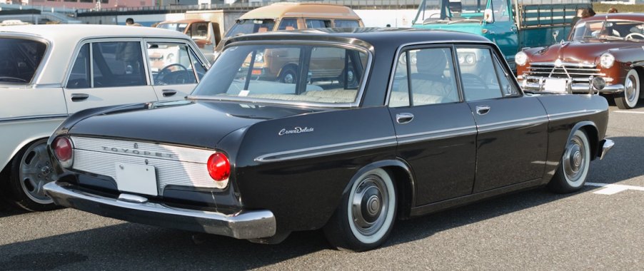 The chrome deck lid of a Toyota Crown luxury sedan from the 1960s