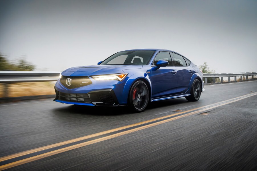 2024 Acura Integra Type S driving down an open road.